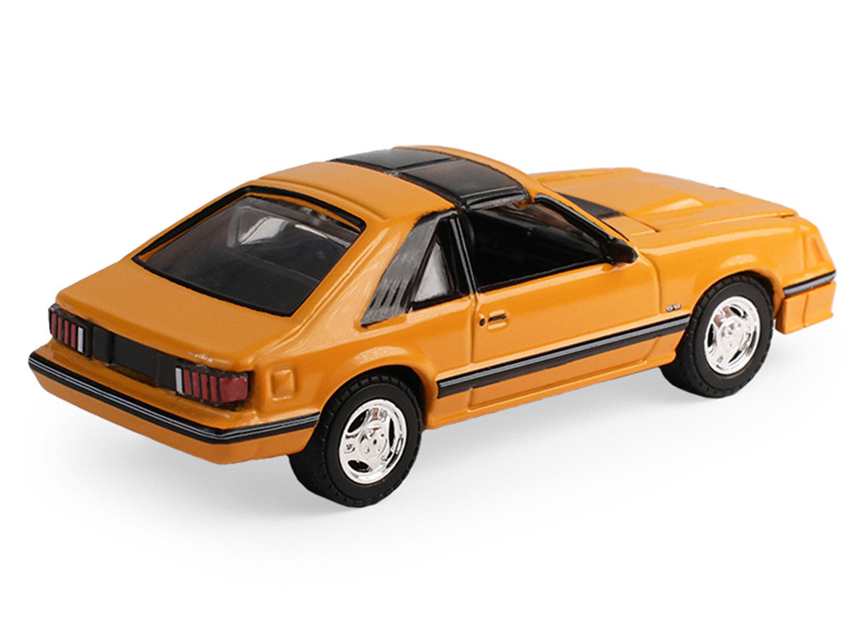 1982 Ford Foxbody Mustang Medium Vanilla Yellow with Black Top "The Mustang Stampede" Series 2 1/64 Diecast Model Car by Greenlight-3