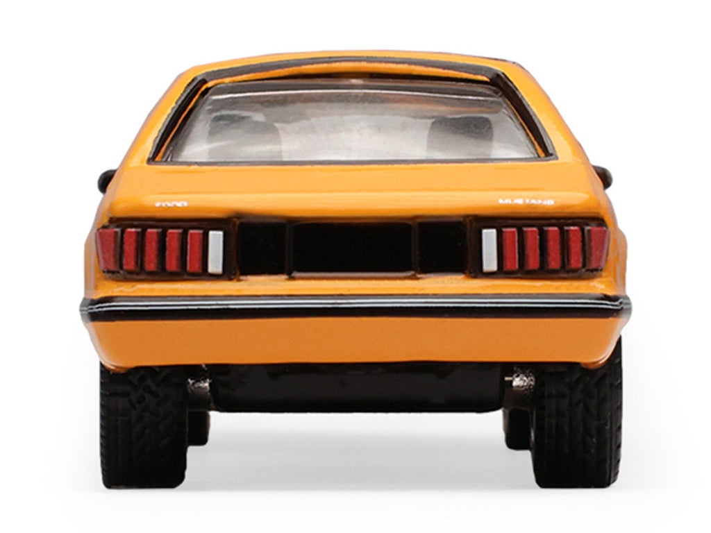1982 Ford Foxbody Mustang Medium Vanilla Yellow with Black Top "The Mustang Stampede" Series 2 1/64 Diecast Model Car by Greenlight-1