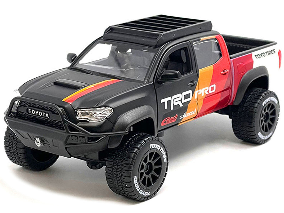 2023 Toyota Tacoma TRD PRO Off Road Pickup Truck Matt Black with Graphics and Roofrack "Maisto Design" Series 1/27 Diecast Model Car by Maisto-1