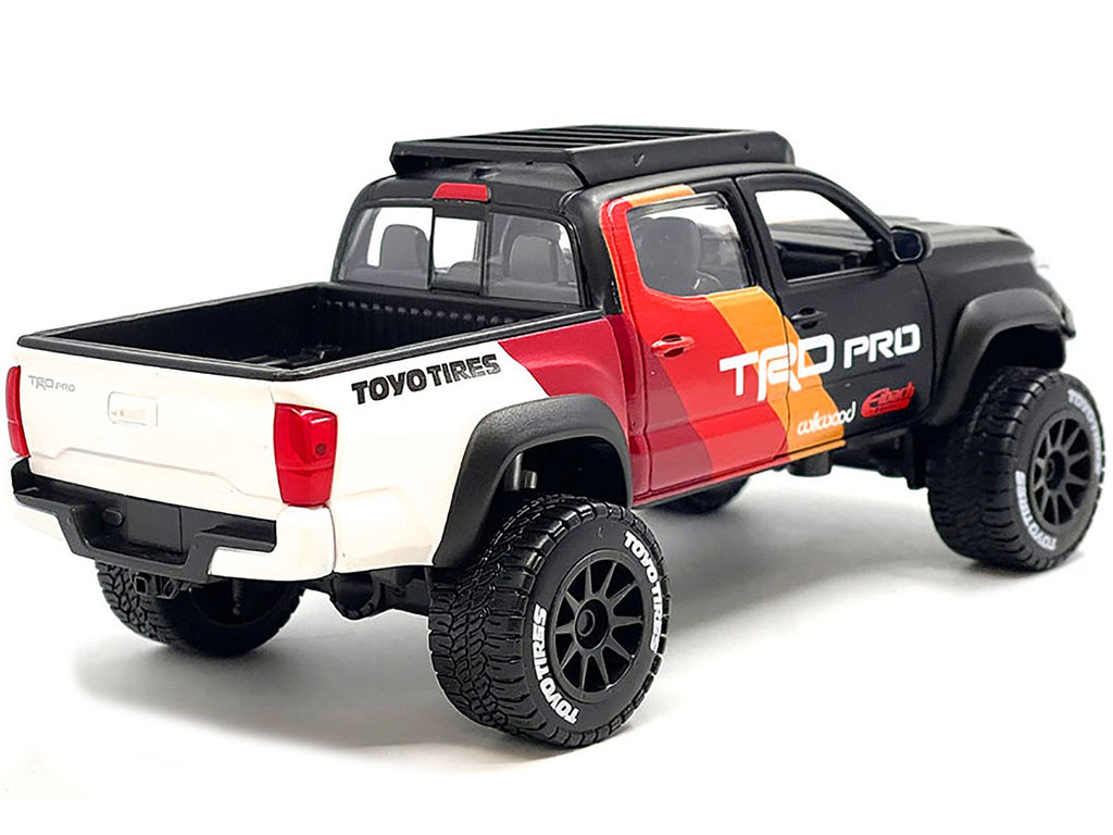 2023 Toyota Tacoma TRD PRO Off Road Pickup Truck Matt Black with Graphics and Roofrack "Maisto Design" Series 1/27 Diecast Model Car by Maisto-0