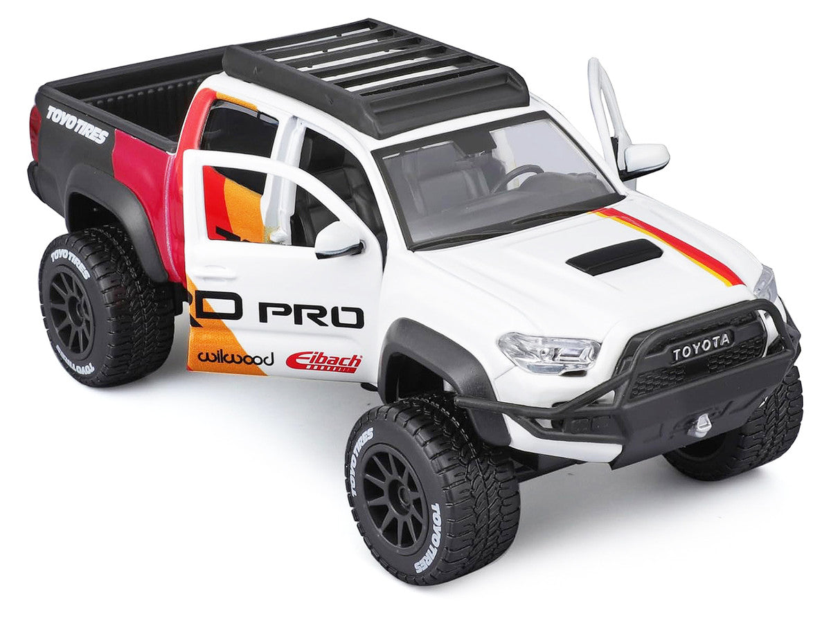 2023 Toyota Tacoma TRD PRO Off Road Pickup Truck White with Graphics and Roof Rack "Maisto Design" Series 1/27 Diecast Model Car Maisto-2