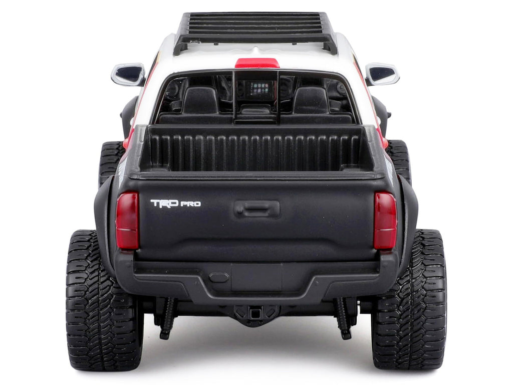 2023 Toyota Tacoma TRD PRO Off Road Pickup Truck White with Graphics and Roof Rack "Maisto Design" Series 1/27 Diecast Model Car Maisto-0