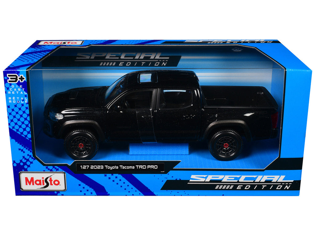 Maisto 1:27 2023 Toyota Tacoma TRD Pro Pickup Black Metallic — product image 3