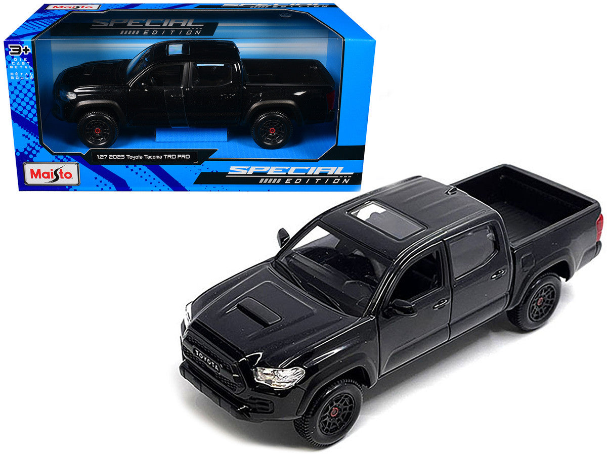 Maisto 1:27 2023 Toyota Tacoma TRD Pro Pickup Black Metallic — product image 1