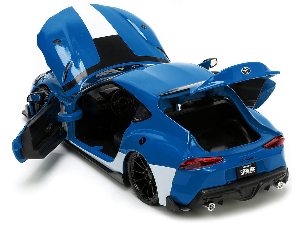 2020 Toyota Supra Blue with Graphics and Max Sterling Diecast Figurine "Robotech" "Hollywood Rides" Series 1/24 Diecast Model Car by Jada-3