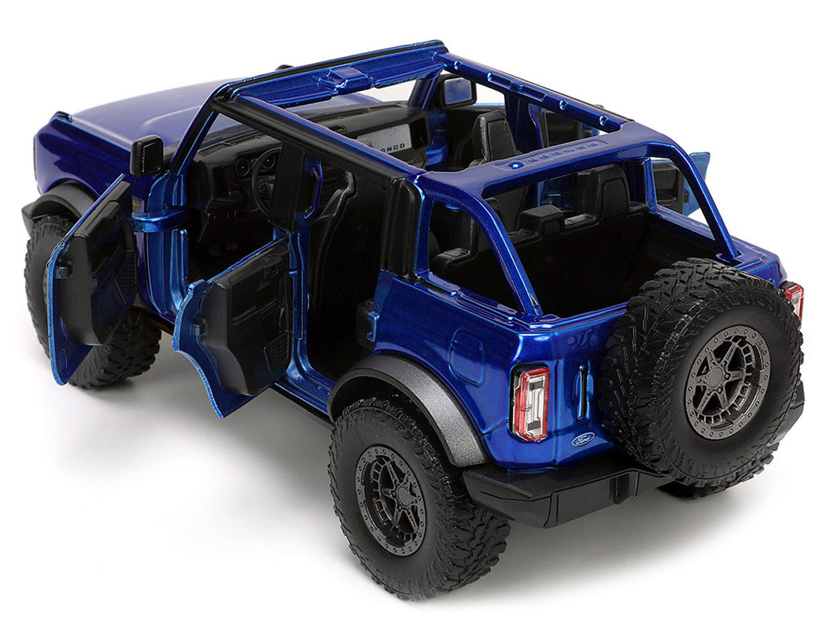 2021 Ford Bronco Open-Top Candy Blue Metallic with Extra Wheels "Just Trucks" Series 1/24 Diecast Model Car by Jada-3