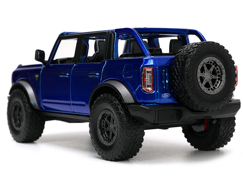 2021 Ford Bronco Open-Top Candy Blue Metallic with Extra Wheels "Just Trucks" Series 1/24 Diecast Model Car by Jada-0