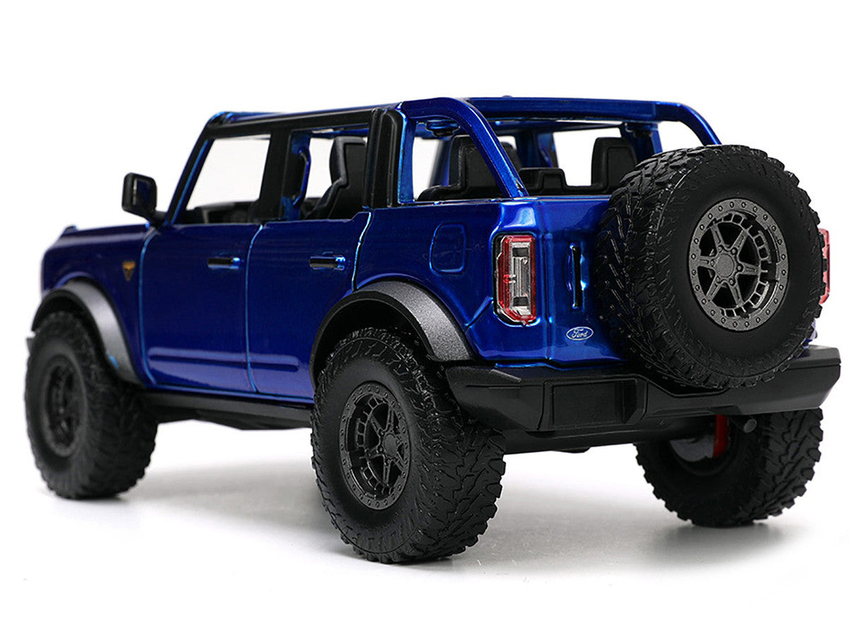 2021 Ford Bronco Open-Top Candy Blue Metallic with Extra Wheels "Just Trucks" Series 1/24 Diecast Model Car by Jada-0