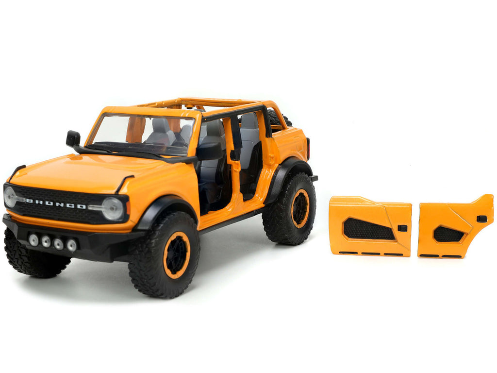 2021 Ford Bronco Orange Metallic with Extra Wheels "Just Trucks" Series 1/24 Diecast Model Car by Jada-1