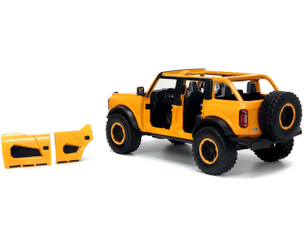 2021 Ford Bronco Orange Metallic with Extra Wheels "Just Trucks" Series 1/24 Diecast Model Car by Jada-2