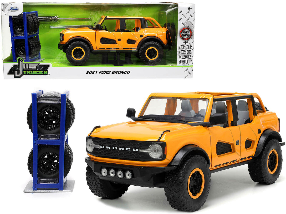 2021 Ford Bronco Orange Metallic with Extra Wheels "Just Trucks" Series 1/24 Diecast Model Car by Jada-0