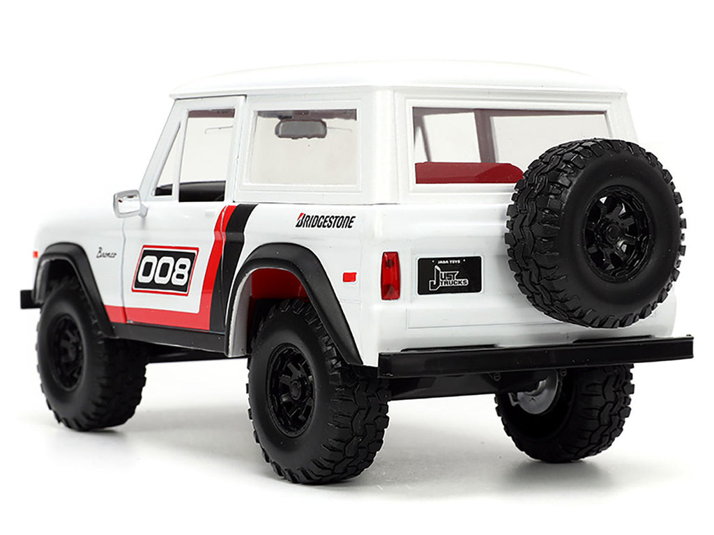 1973 Ford Bronco #008 White with Red and Black Stripes and Red Interior with Extra Wheels "Just Trucks" Series 1/24 Diecast Model Car by Jada-4