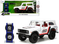 1973 Ford Bronco #008 White with Red and Black Stripes and Red Interior with Extra Wheels "Just Trucks" Series 1/24 Diecast Model Car by Jada-0