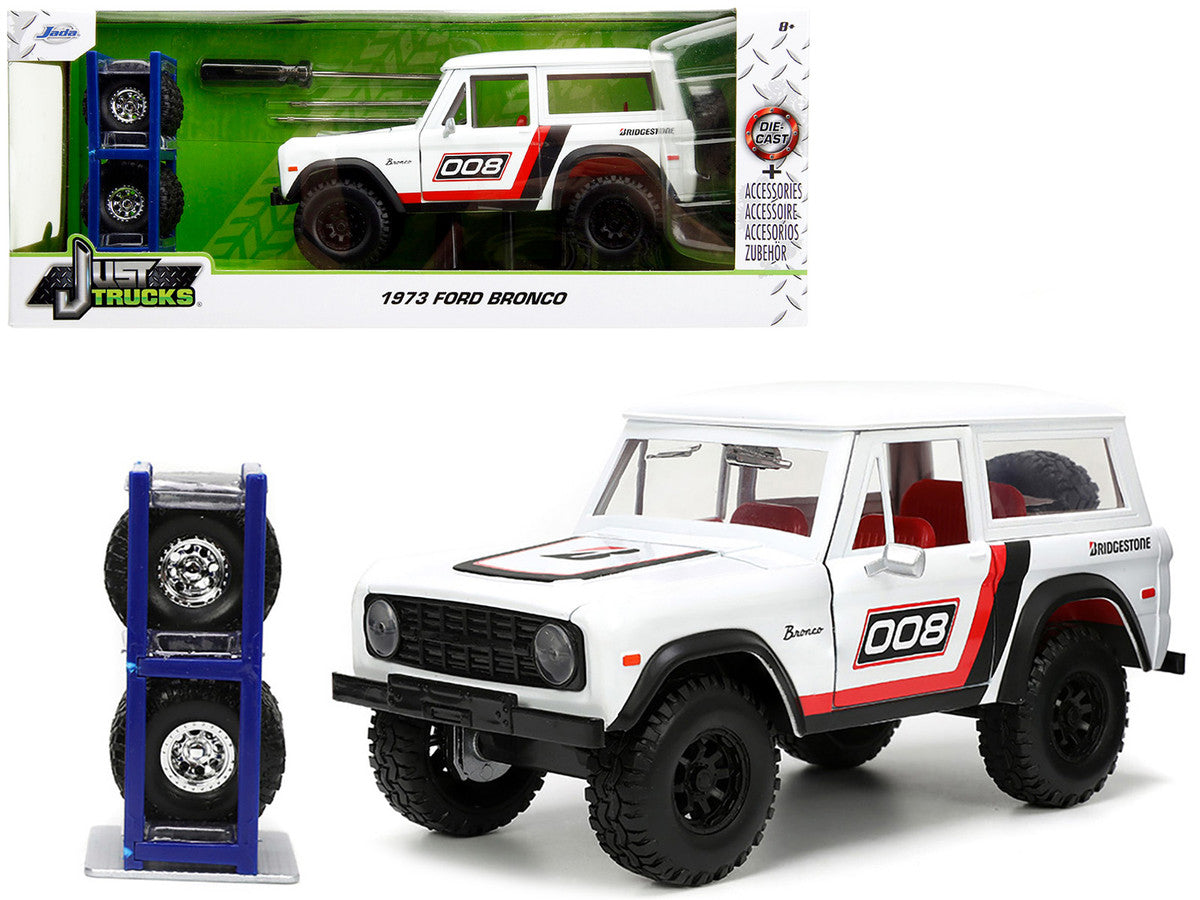 1973 Ford Bronco #008 White with Red and Black Stripes and Red Interior with Extra Wheels "Just Trucks" Series 1/24 Diecast Model Car by Jada-0