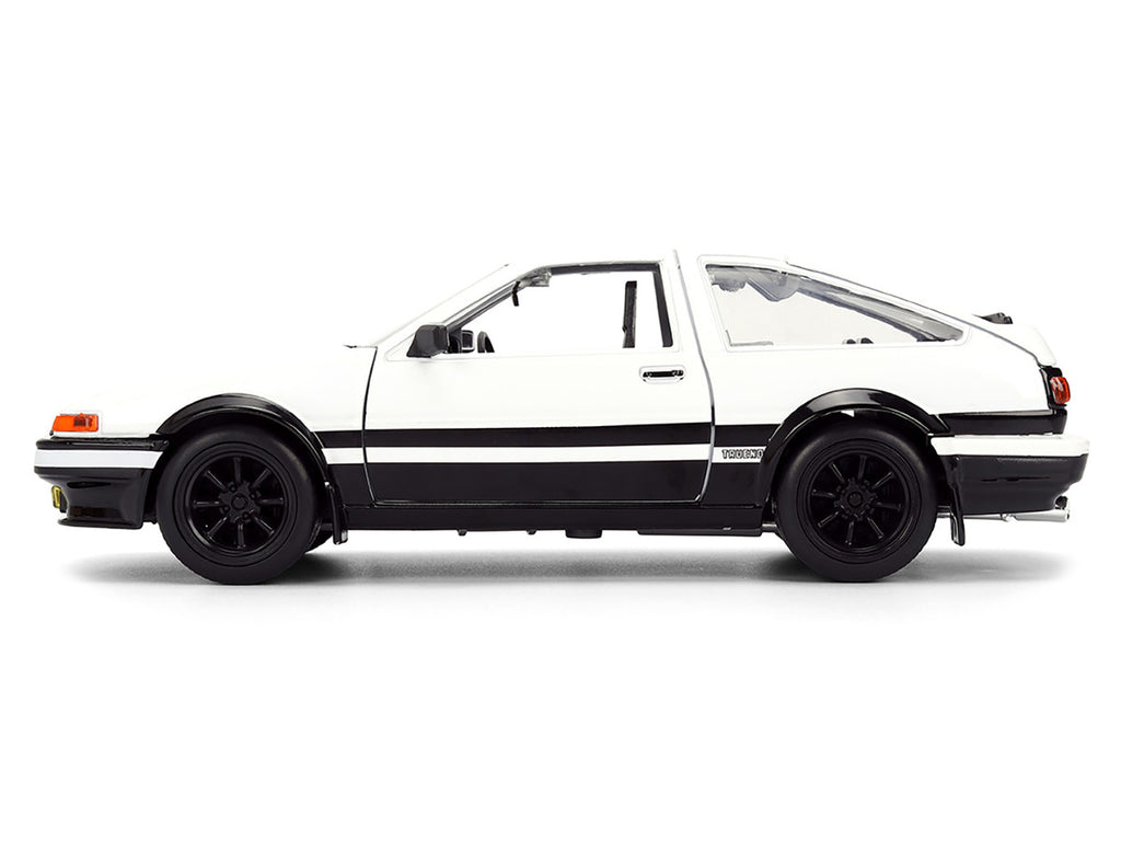 Toyota Trueno (AE86) RHD (Right Hand Drive) White and Black with Graphics and Takumi Diecast Figure "Initial D" (1998-2021) TV Series "Anime Hollywood Rides" Series 1/24 Diecast Model by Jada-1