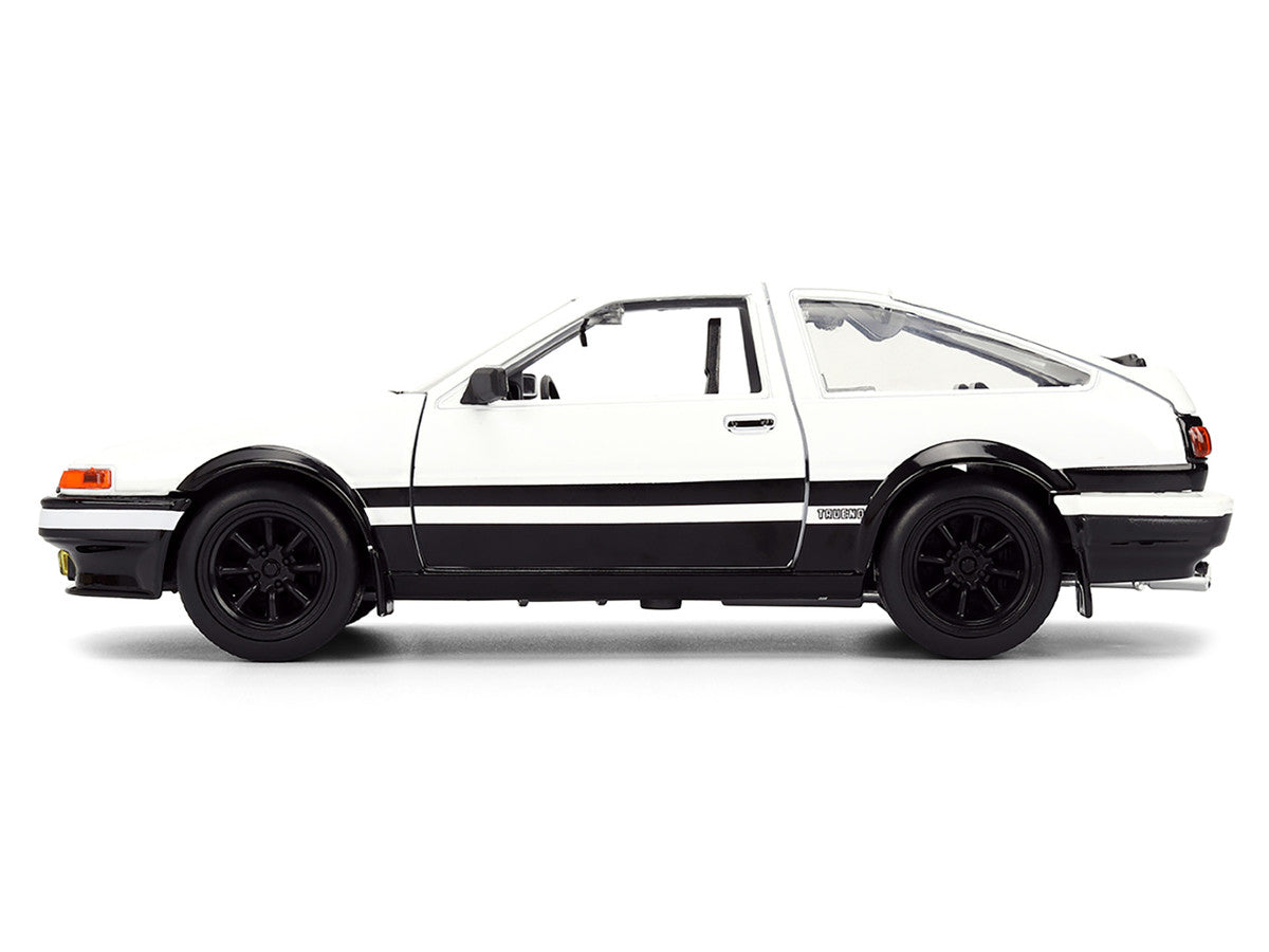 Toyota Trueno (AE86) RHD (Right Hand Drive) White and Black with Graphics and Takumi Diecast Figure "Initial D" (1998-2021) TV Series "Anime Hollywood Rides" Series 1/24 Diecast Model by Jada-1