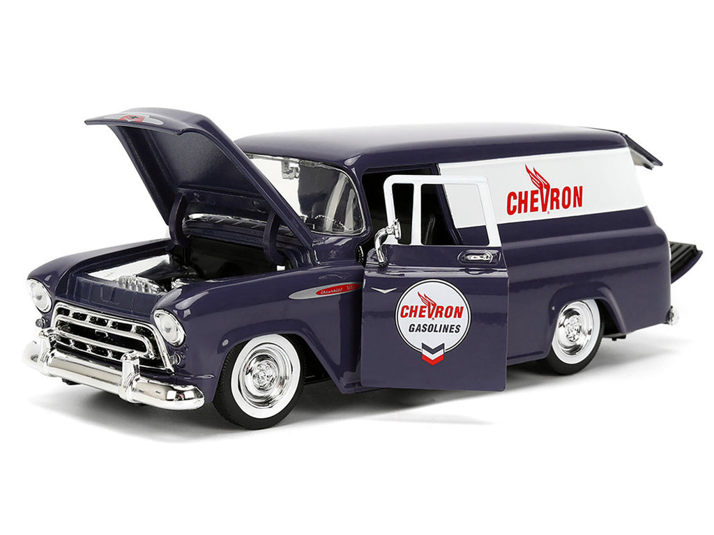 1957 Chevrolet Suburban "Chevron" Dark Blue with White Stripes and Chevron Gas Pump "Just Trucks" Series 1/24 Diecast Model Car by Jada-1
