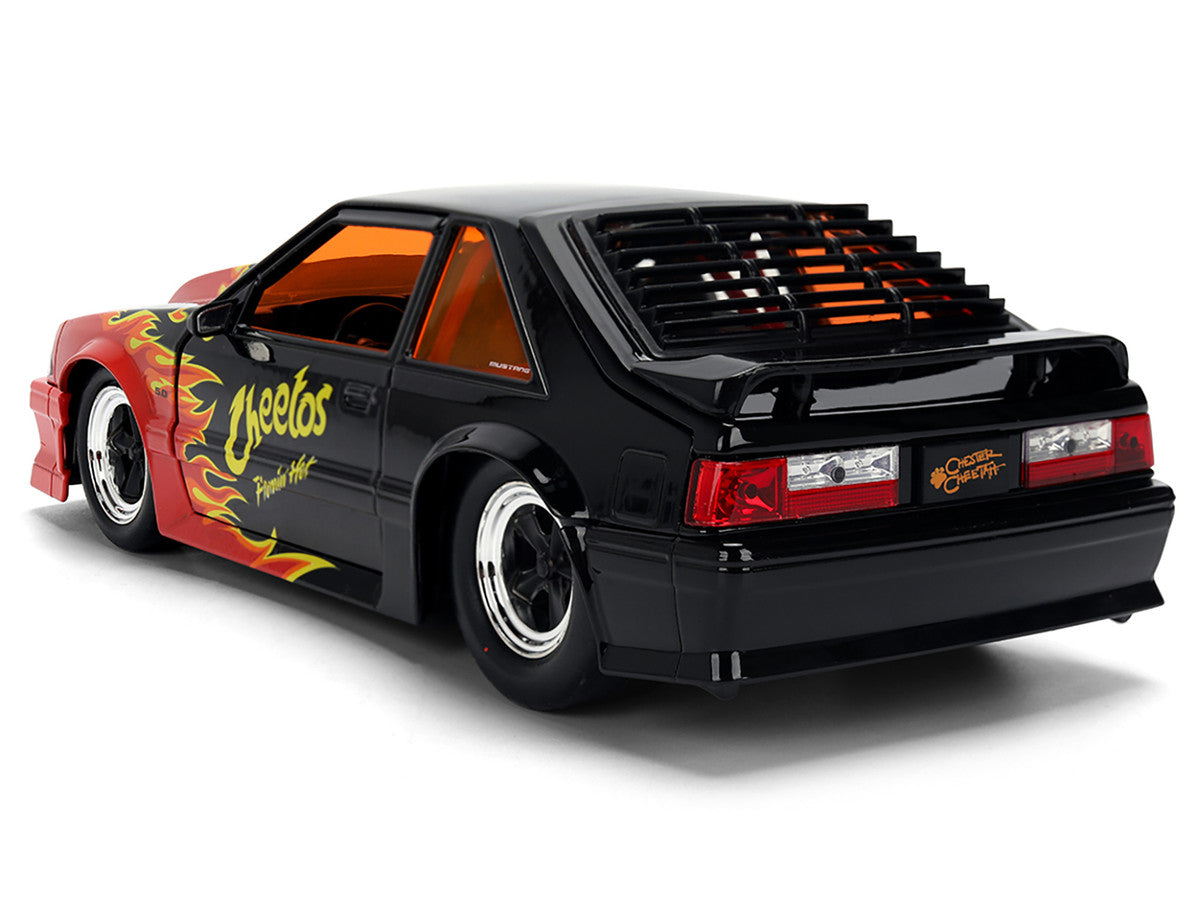 1989 Ford Mustang GT Black with Red Flame Graphics and Chester Cheetah Diecast Figure "Cheetos Flamin' Hot" "Hollywood Rides" Series 1/24 Diecast Model Car by Jada-1