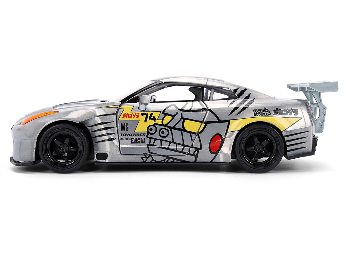 2009 Nissan GT-R (R35) Ben Sopra Brushed Metal with Black Top and Graphics and Mechagodzilla Diecast Figure "Godzilla" Franchise "Anime Hollywood Rides" Series 1/24 Diecast Model by Jada-2