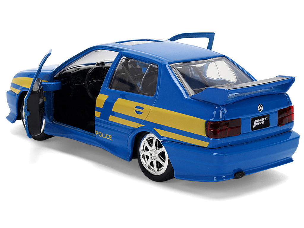 Volkswagen Jetta Police Vehicle "Rio Federal Highway Police" Blue with Yellow Stripes "Fast Five" (2011) Movie "Fast & Furious" Series 1/32 Diecast Model Car by Jada-1
