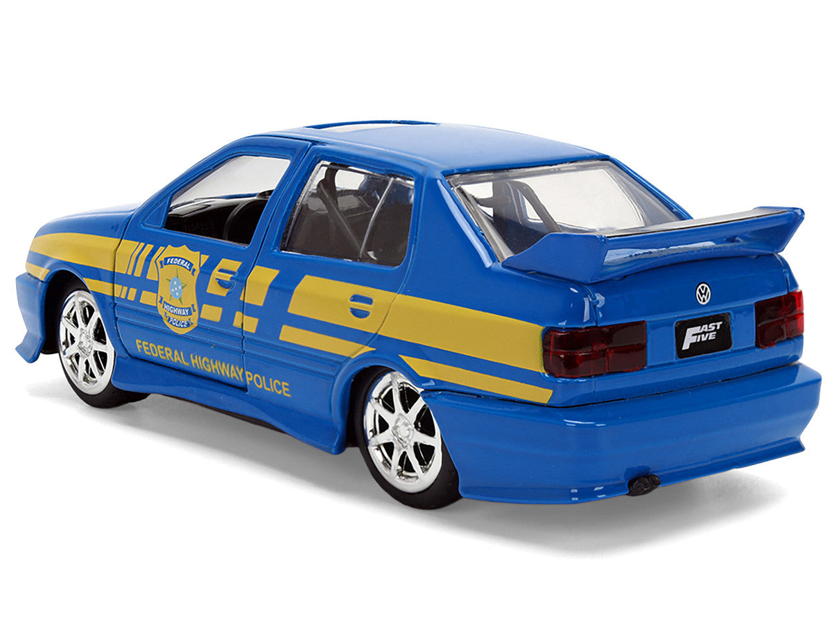 Volkswagen Jetta Police Vehicle "Rio Federal Highway Police" Blue with Yellow Stripes "Fast Five" (2011) Movie "Fast & Furious" Series 1/32 Diecast Model Car by Jada-2