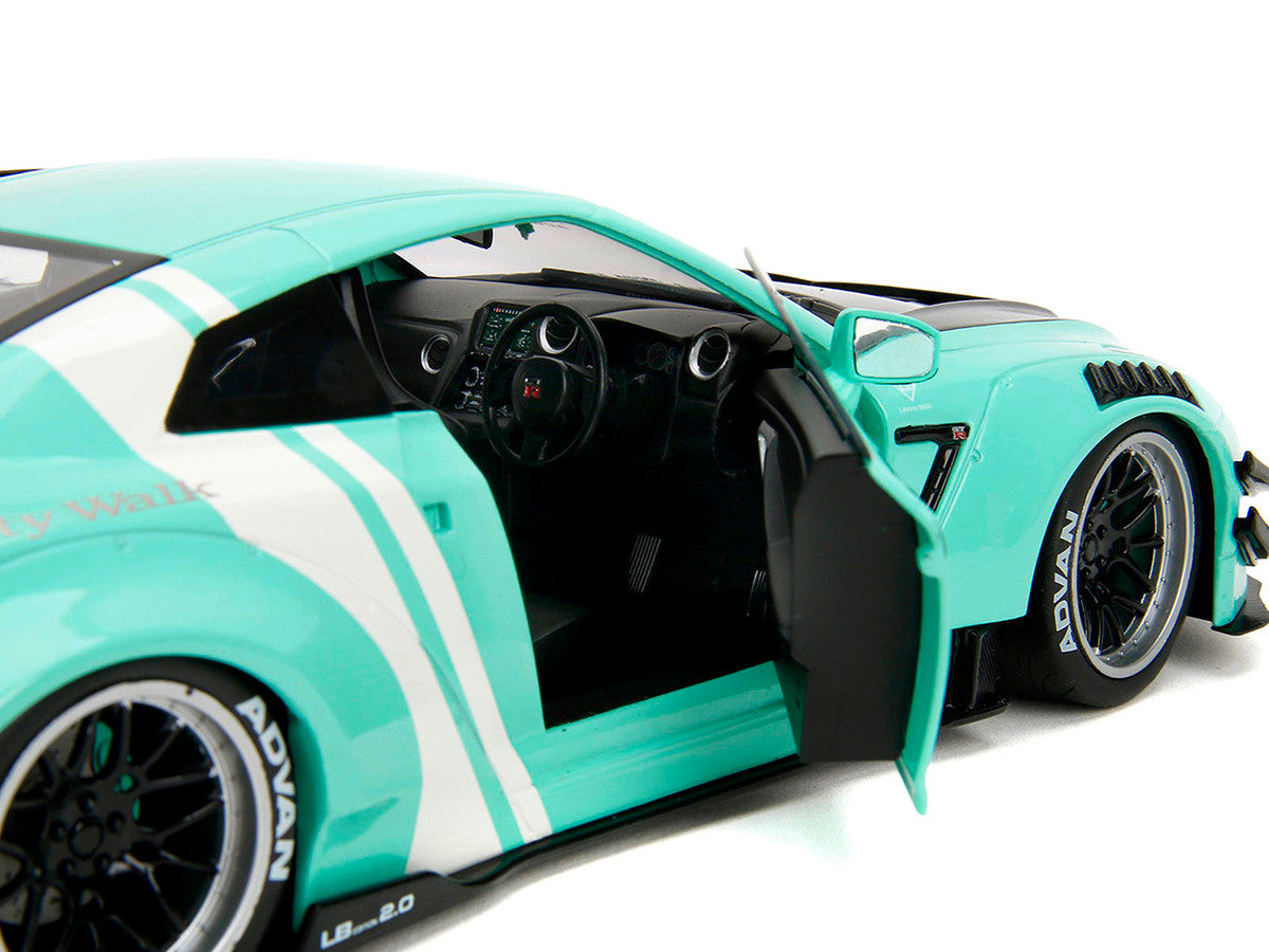 Nissan GT-R (R35) Liberty Walk Body Kit 2.0 RHD (Right Hand Drive) Light Blue with Black Hood and White Stripes "Pink Slips" Series 1/18 Diecast Model Car by Jada-1