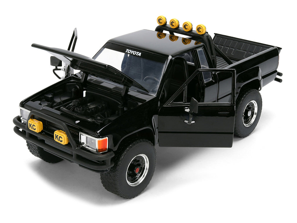 1985 Toyota SR5 Pickup Truck Black with Marty's Skateboard "Back to the Future" (1985) Movie "Hollywood Rides" Series 1/24 Diecast Model Car by Jada-3