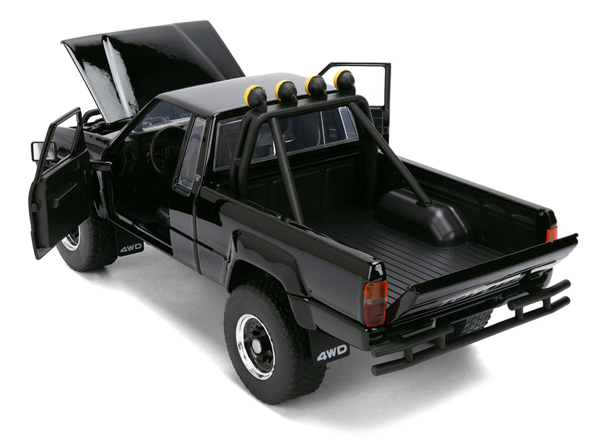 1985 Toyota SR5 Pickup Truck Black with Marty's Skateboard "Back to the Future" (1985) Movie "Hollywood Rides" Series 1/24 Diecast Model Car by Jada-1