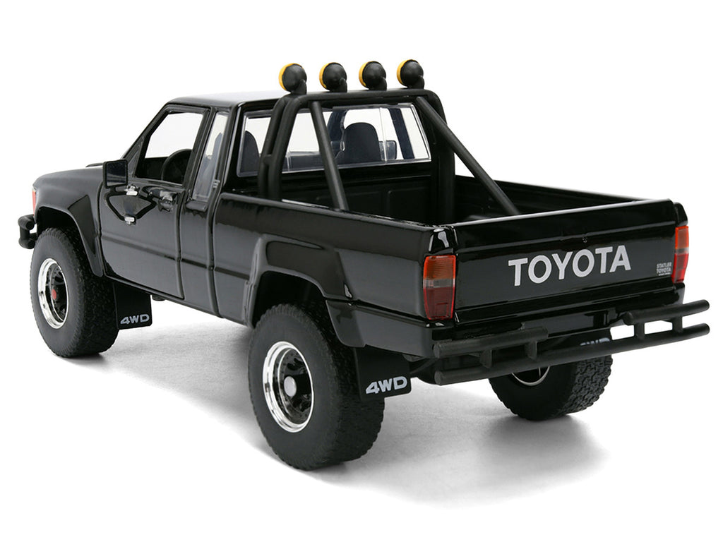 1985 Toyota SR5 Pickup Truck Black with Marty's Skateboard "Back to the Future" (1985) Movie "Hollywood Rides" Series 1/24 Diecast Model Car by Jada-2