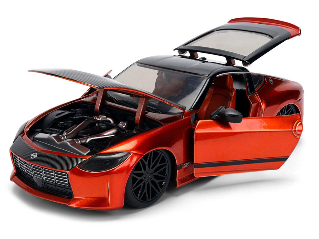 2023 Nissan Z Orange Metallic with Carbon Hood and Black Top "JDM Tuners" Series 1/24 Diecast Model Car by Jada-2