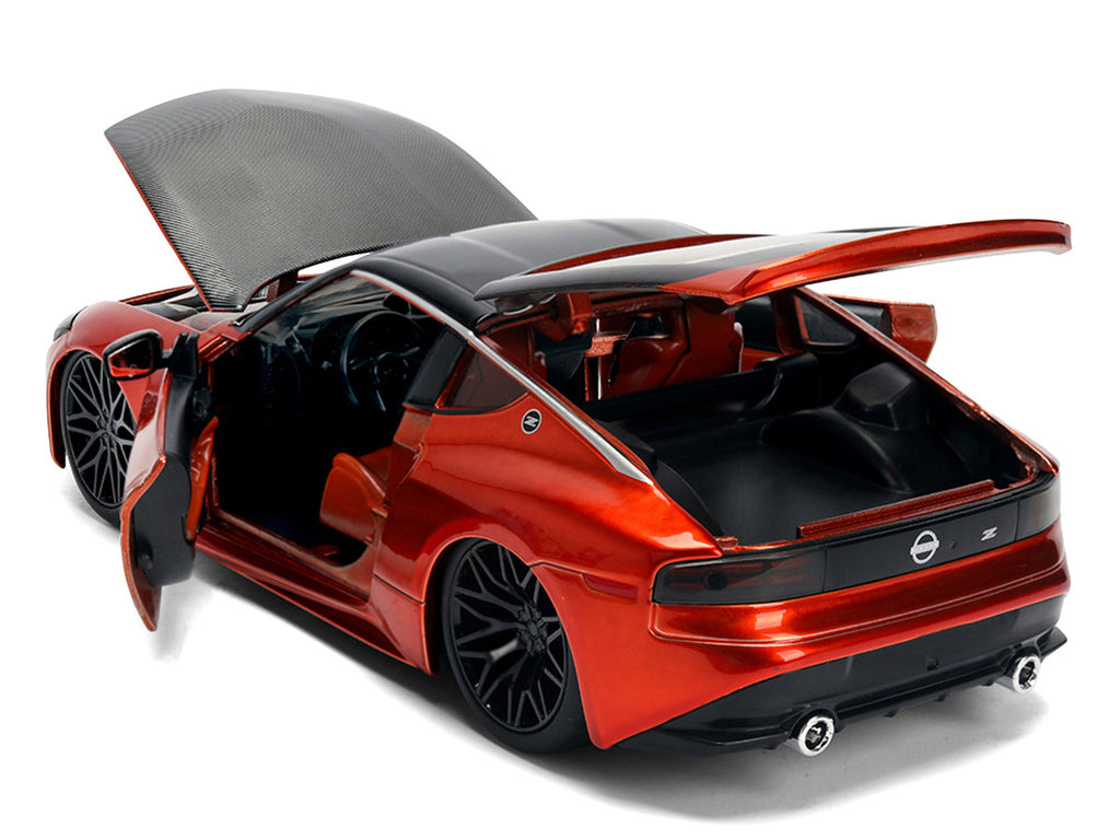 2023 Nissan Z Orange Metallic with Carbon Hood and Black Top "JDM Tuners" Series 1/24 Diecast Model Car by Jada-3
