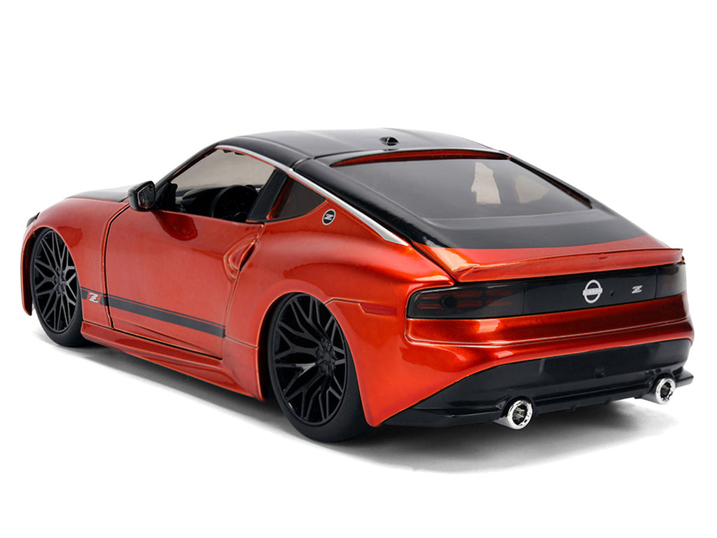 2023 Nissan Z Orange Metallic with Carbon Hood and Black Top "JDM Tuners" Series 1/24 Diecast Model Car by Jada-1