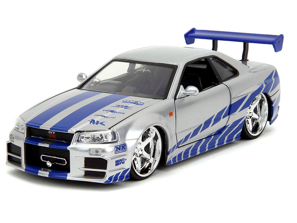 Brian's Nissan Skyline GT-R (R34) Silver Metallic with Blue Stripes and Suki's Honda S2000 Pink with Graphics Set of 2 Cars "Fast & Furious 25th Anniversary" "Fast & Furious" Series 1/24 Diecast Model Cars by Jada-3