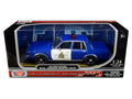 1986 Dodge Diplomat "Royal Canadian Mounted Police" Metallic Blue and White 1/24 Diecast Model Car by Motormax-0