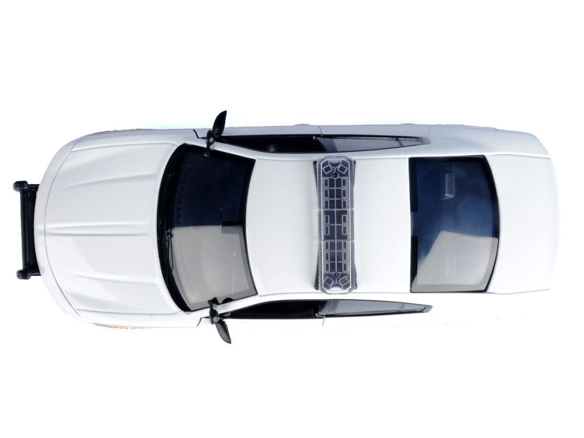 2023 Dodge Charger Pursuit Police Car "RCMP (Royal Canadian Mounted Police)" White "Law Enforcement and Public Service" Series 1/24 Diecast Model Car by Motormax-1