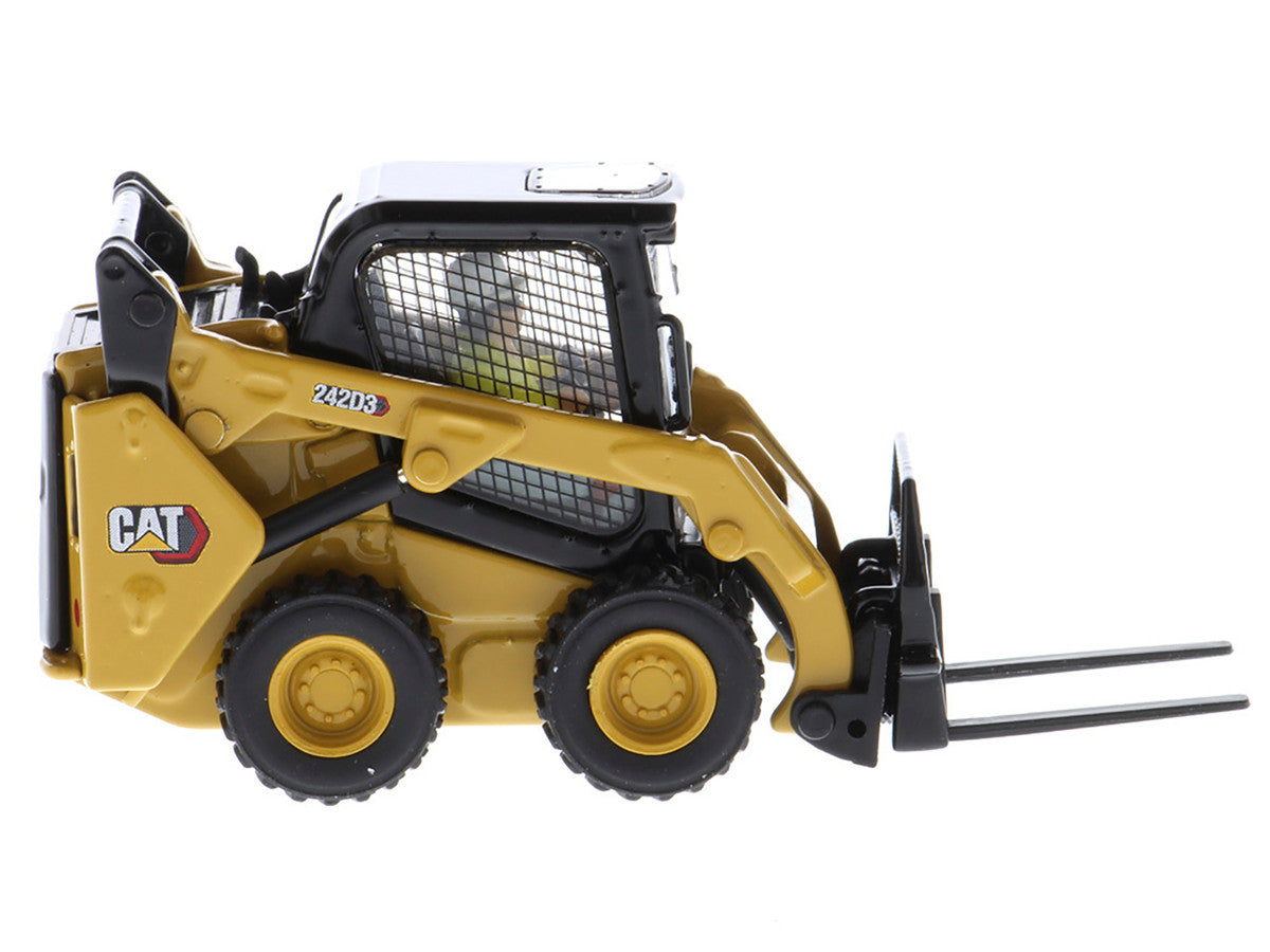 CAT Caterpillar 242D3 Wheeled Skid Steer Loader with Work Tools and Operator Yellow "High Line Series" 1/50 Diecast Model by Diecast Masters-1