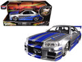 Brian's Nissan GTR Skyline R34 RHD (Right Hand Drive) Silver with Blue Stripes "Fast & Furious 25th Anniversary" 1/24 Diecast Model Car by Jada-0