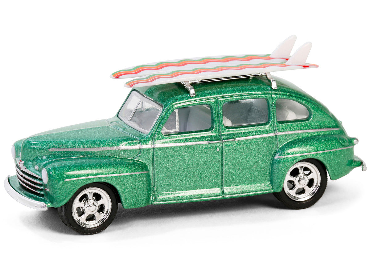 1946 Ford Fordor Super Deluxe Green Metallic with White Interior and Roof Rack with Surfboards "The Hobby Shop" Series 16 1/64 Diecast Model Car by Greenlight-1