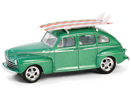 1946 Ford Fordor Super Deluxe Green Metallic with White Interior and Roof Rack with Surfboards "The Hobby Shop" Series 16 1/64 Diecast Model Car by Greenlight-1