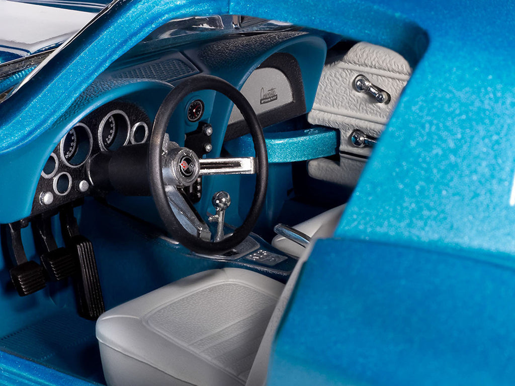 1967 Chevrolet Corvette Stingray Light Blue Metallic with White Hood Stripe "American Muscle" Series 1/18 Diecast Model Car by Auto World-1