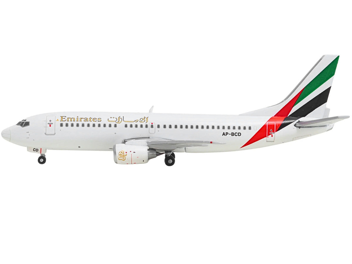 Boeing 737-300 Commercial Aircraft "Emirates Airlines" (AP-BCD) White with Striped Tail 1/400 Diecast Model by GeminiJets-0