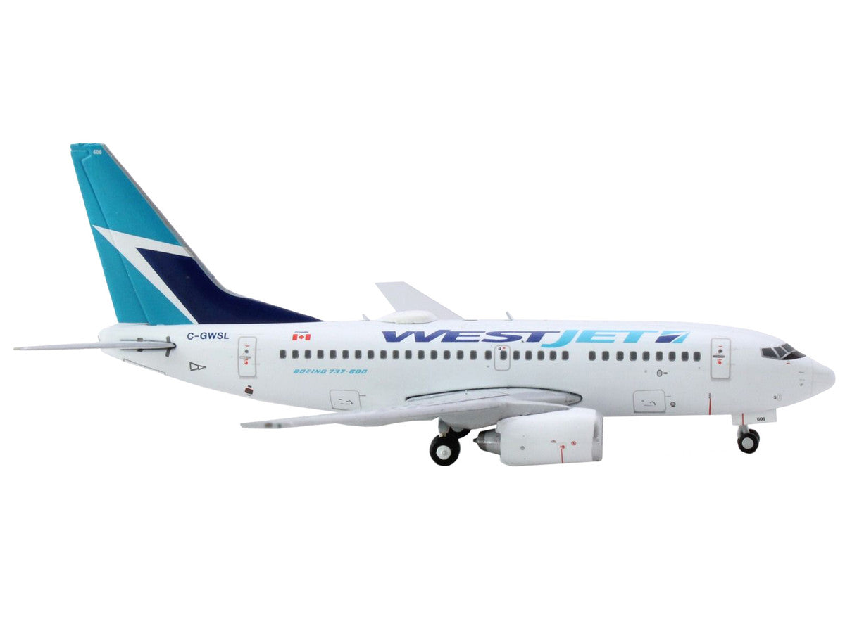 Boeing 737-600 Commercial Aircraft "Westjet Airlines" (C-GWSL) White with Blue Tail 1/400 Diecast Model Airplane by GeminiJets-0