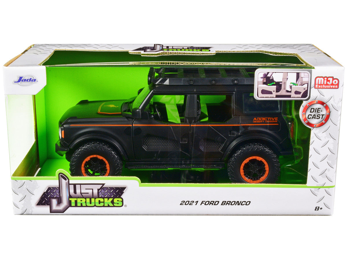 2021 Ford Bronco Matt Black with Orange Stripes and Roof Rack "Addictive Desert Designs" "Just Trucks" Series 1/24 Diecast Model Car by Jada-0