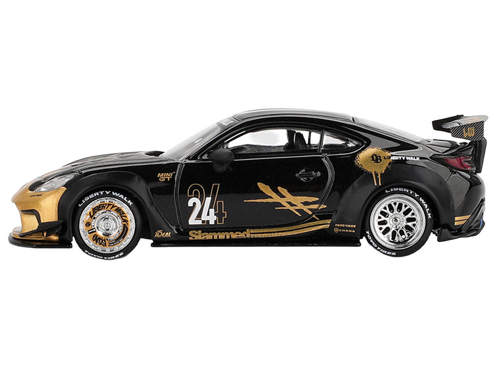 Toyota GR86 "LB-Nation - Liberty Walk" #24 Black with Carbon Hood and Gold Graphics Limited Edition 1/64 Diecast Model Car by Mini GT-0