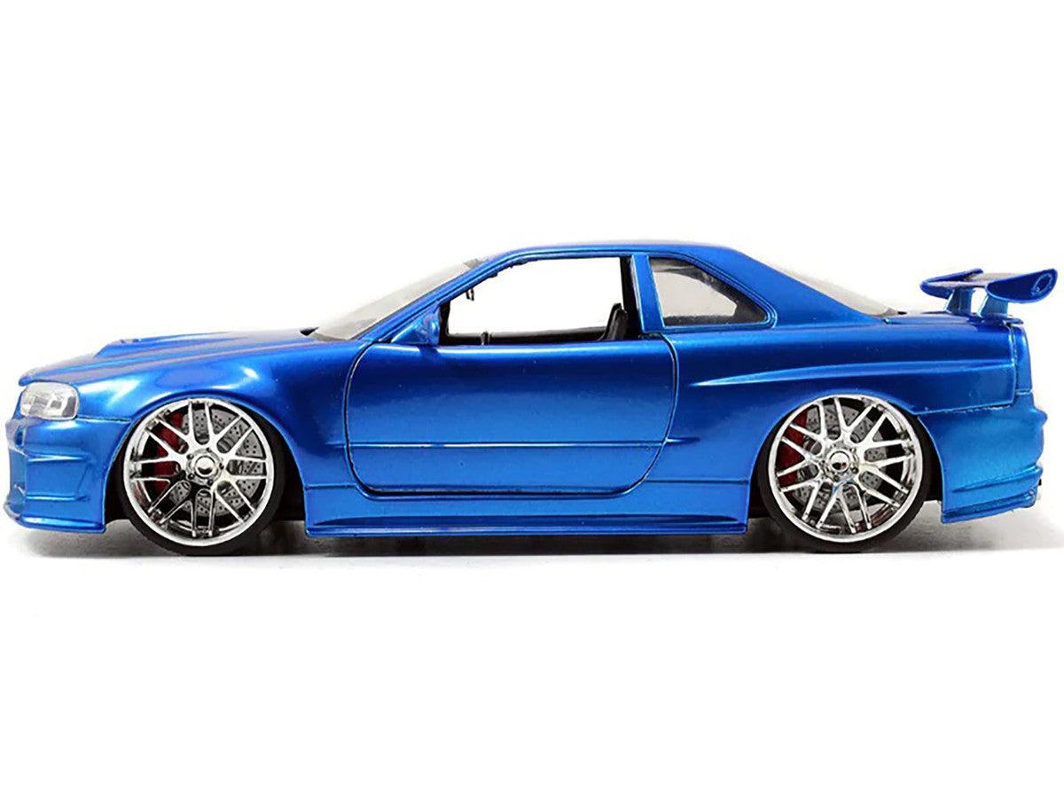 Brian's Nissan GTR Skyline R34 RHD (Right Hand Drive) Blue 25th Anniversary "Fast & Furious" Movie 1/24 Diecast Model Car by Jada-0