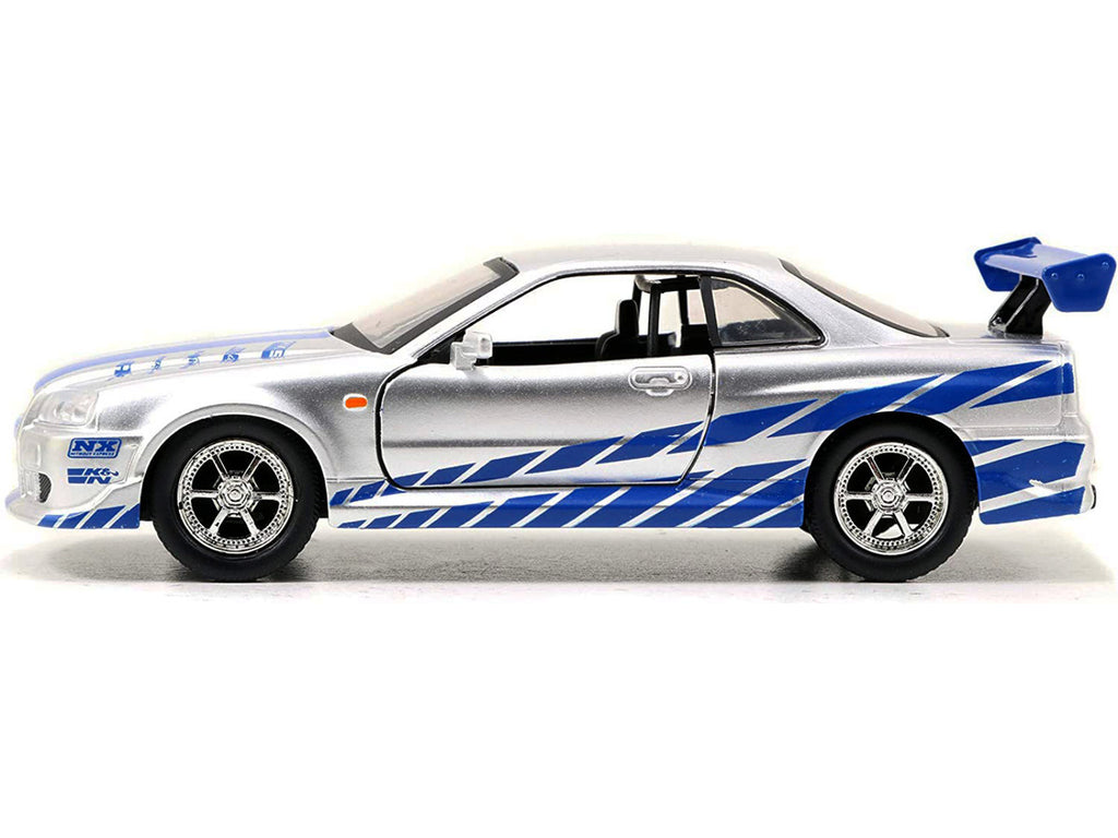 Brian's Nissan Skyline GT-R (R34) RHD (Right Hand Drive) Silver Metallic with Blue Stripes "2 Fast 2 Furious" (2003) Movie "Fast & Furious 25th Anniversary" Series 1/32 Diecast Car Model by Jada-1