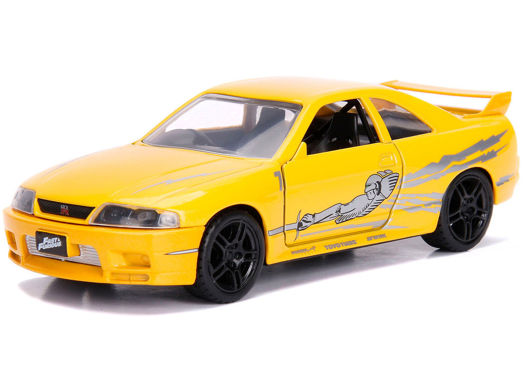 Leon's Nissan Skyline GT-R (BCNR33) Yellow Metallic with Graphics "Fast & Furious" Series 1/32 Diecast Model Car by Jada-1